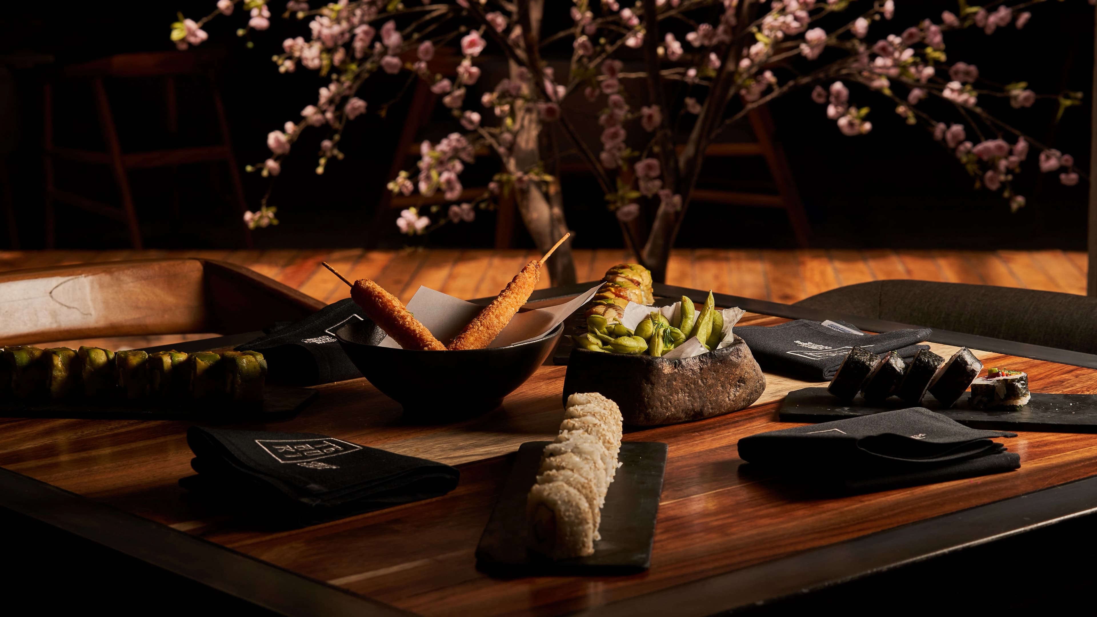 Japanese dishes on a dining table at SORA Sushi